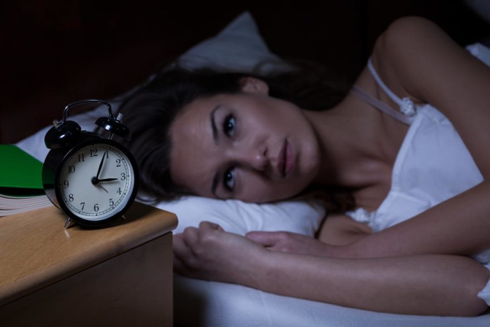 woman suffering from insomnia