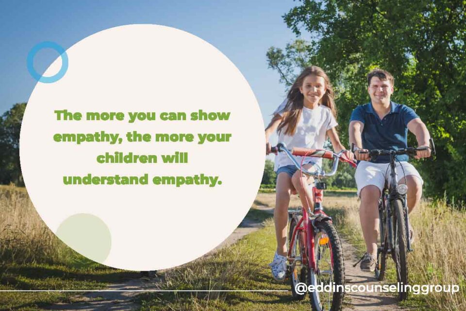 dad and daughter on a bike ride, show empathy to teach empathy
