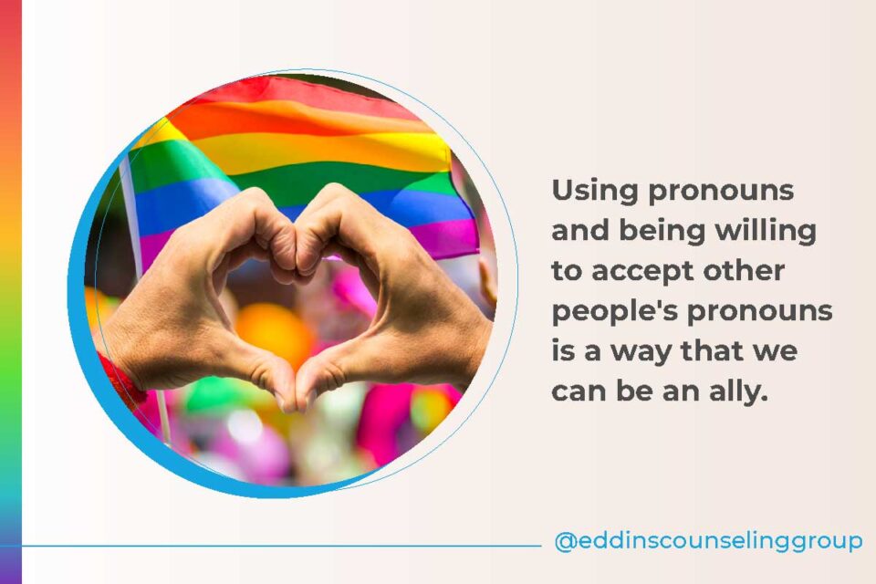 heart emoji in front of rainbow flag