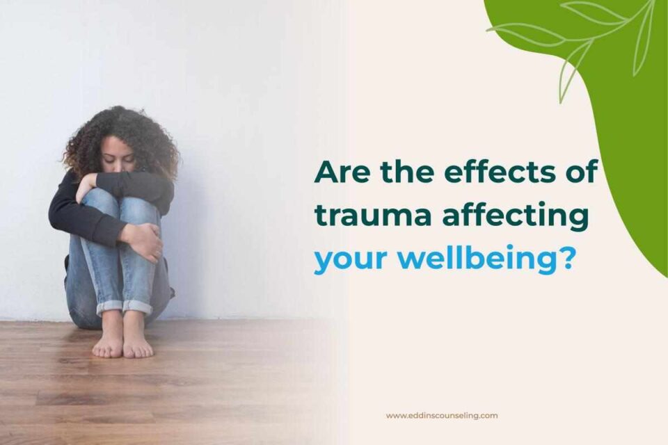 are the effects of trauma affecting your well being? woman sitting in fetal position on the floor