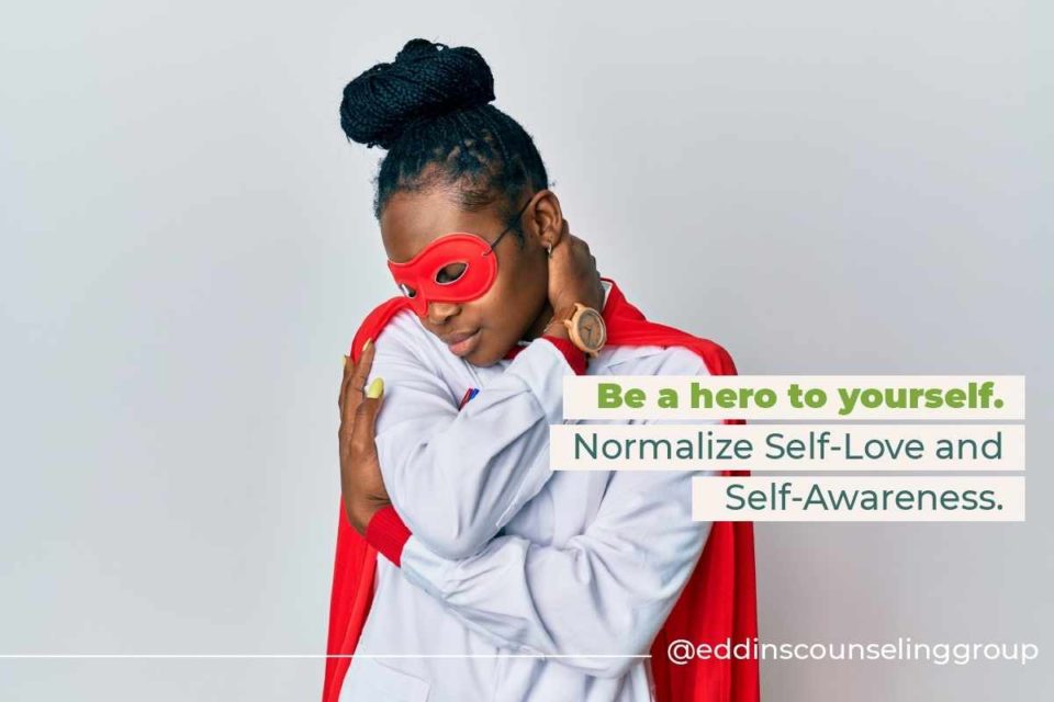 black woman hugging herself self care self awareness trauma therapy