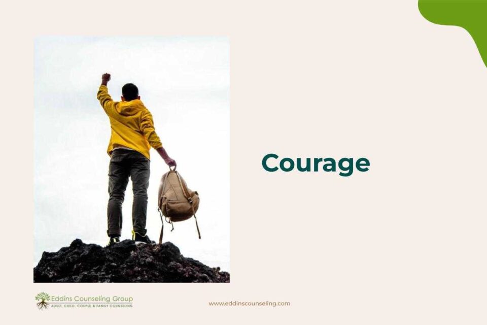 courage person climbing a mountain
