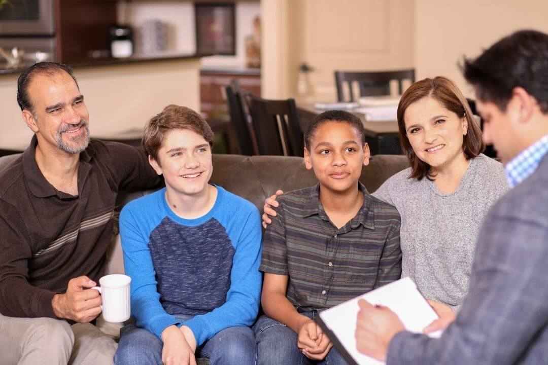Family with teens getting counseling