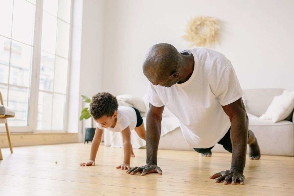 Father exercising with his child to cope with ADHD