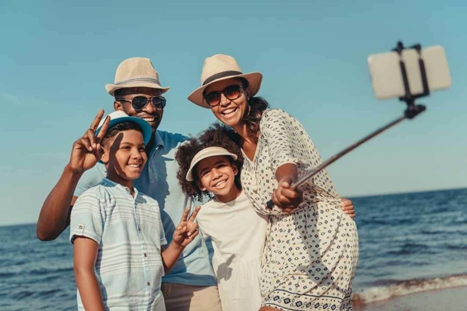 Avoid Vacation Frustration: 6 Tips to Stay Sane with the Kids black family happy on beach vacation