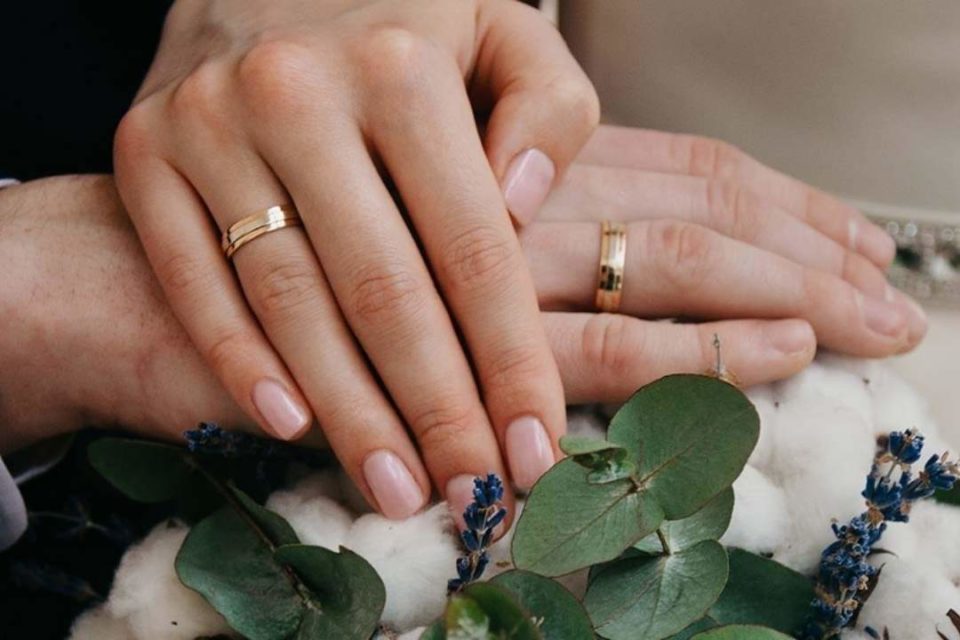 Before Getting Marriage Counseling, 9 Questions to Ask man and wife hands wedding rings
