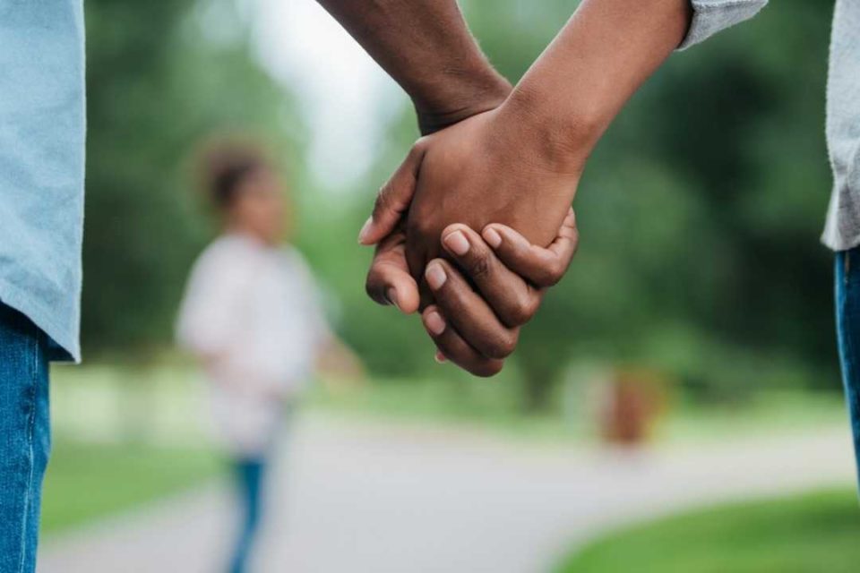 couple holding hands