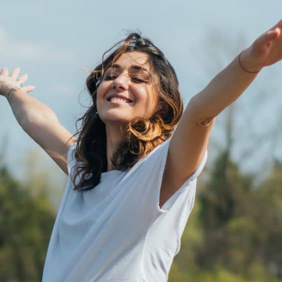 Happy woman working on her mental health
