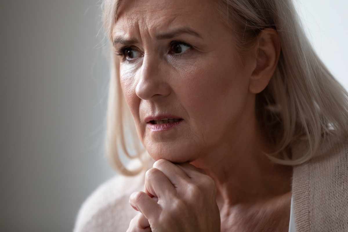 white woman worried about someone with addiction how to help someone with addiction