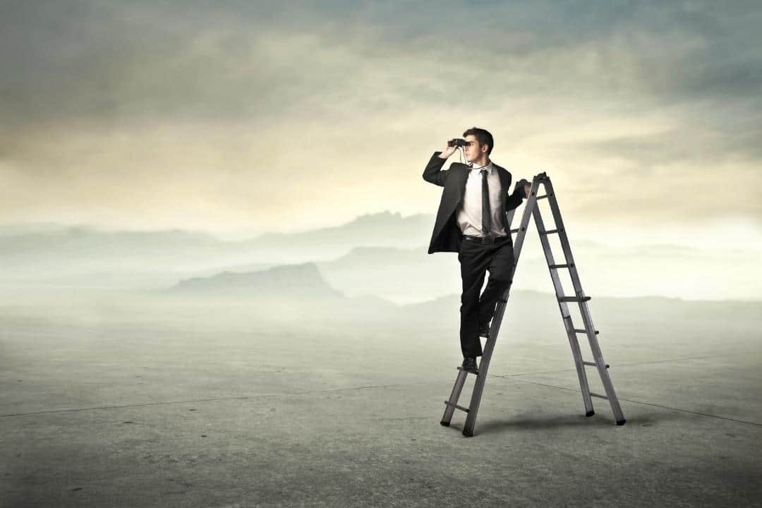 midlife career change man on ladder