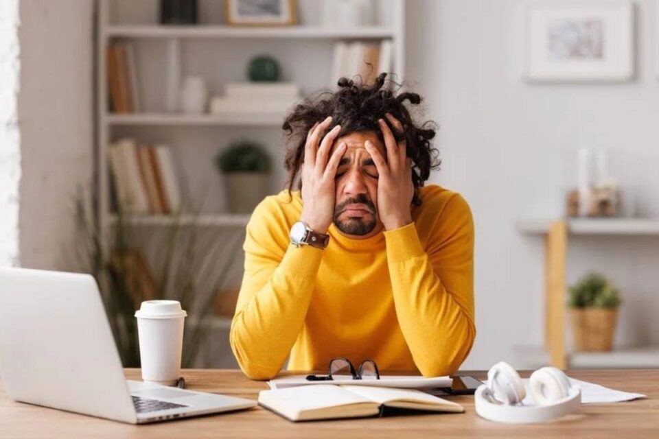 Man trying to face feelings of ovewhelm