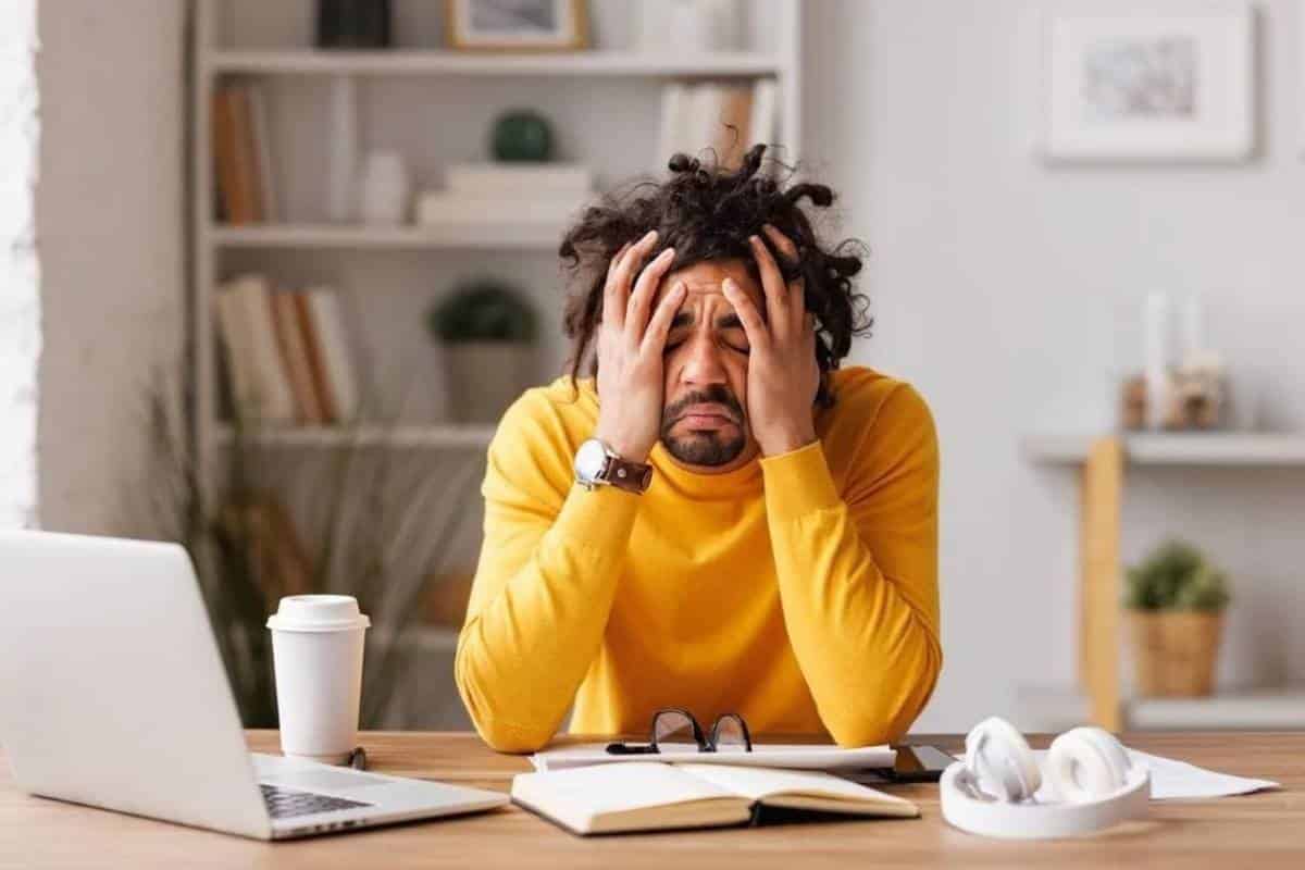 Man trying to face feelings of ovewhelm