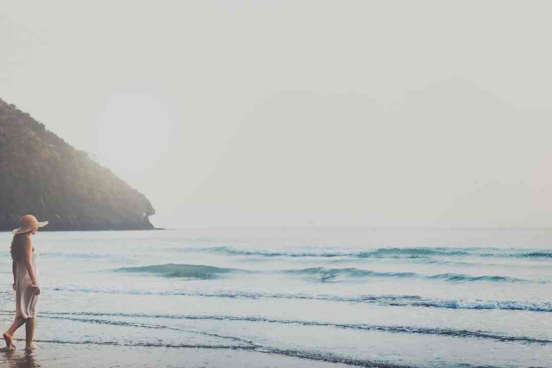 lady in hat at beach resilience