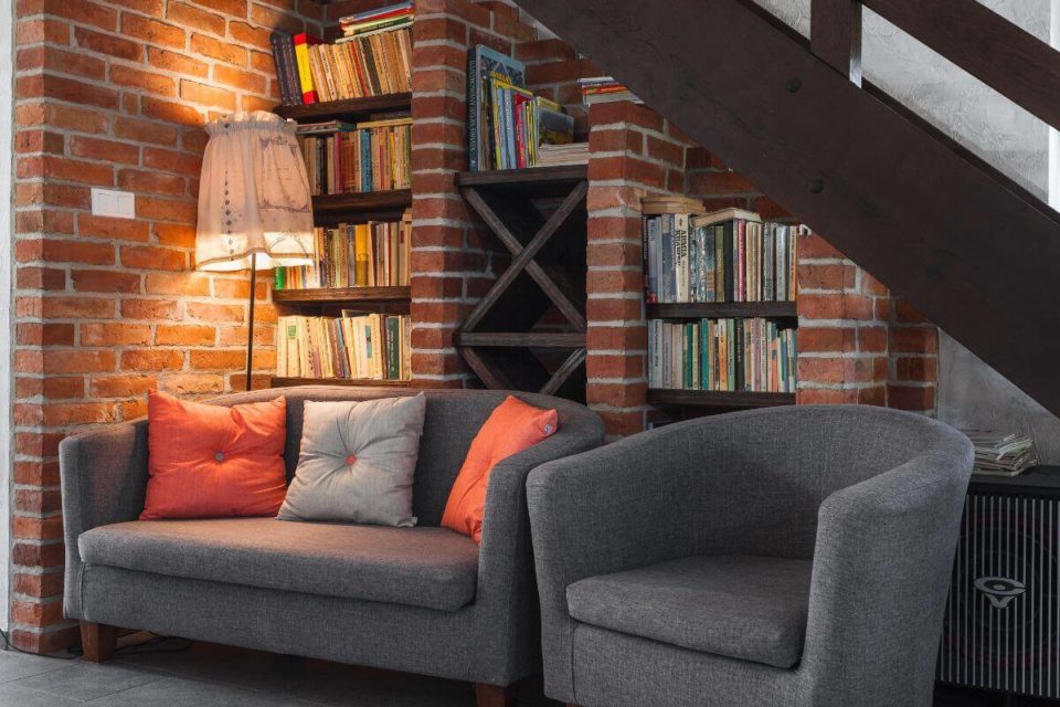 A cozy living room filled with books