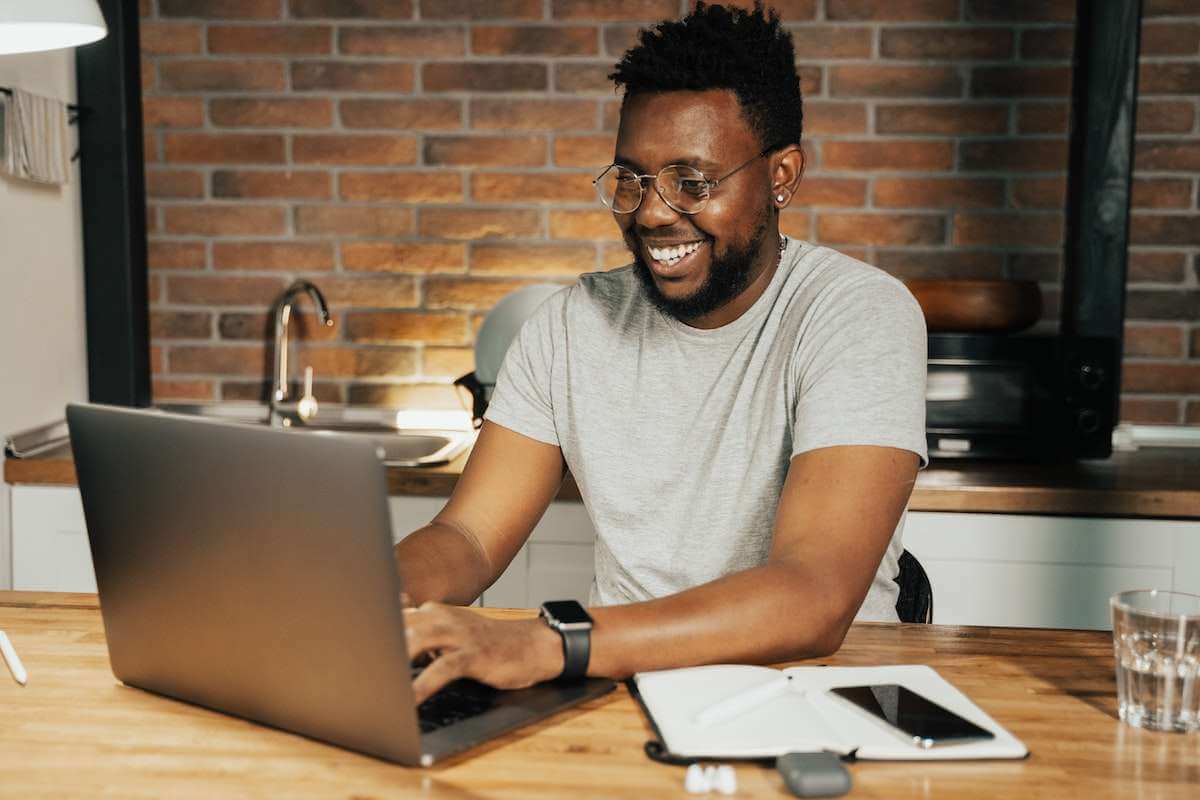Man staying at home, navigating social connections
