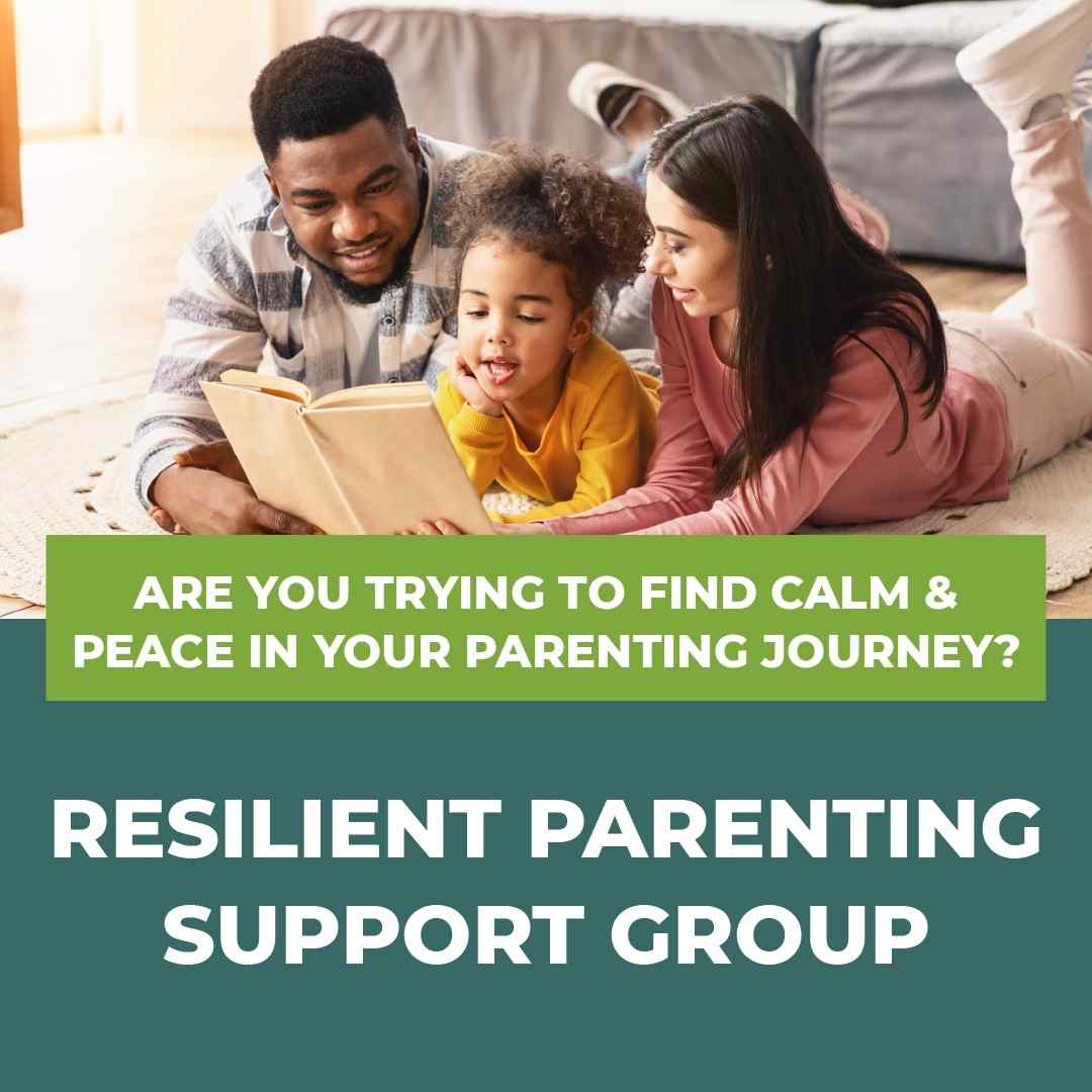 bi-racial family laying on ground reading book together laughing resilient parenting support group