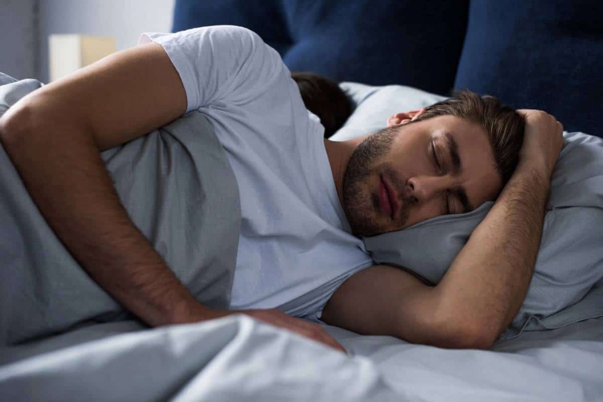 Man working on his sleep hygiene