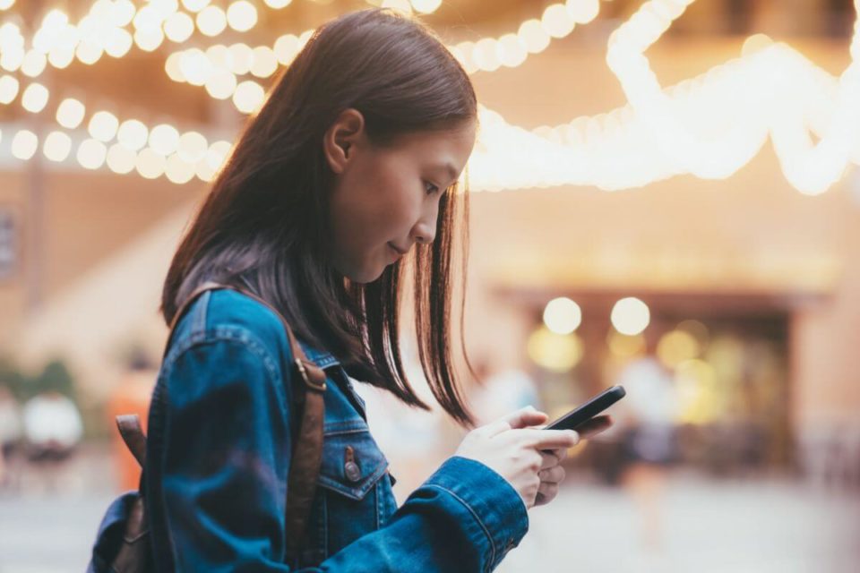 Teenager staring at her phone