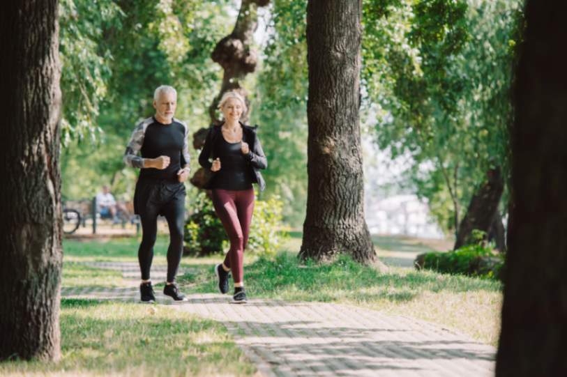 Mature couple using physical activity to improve their mental health