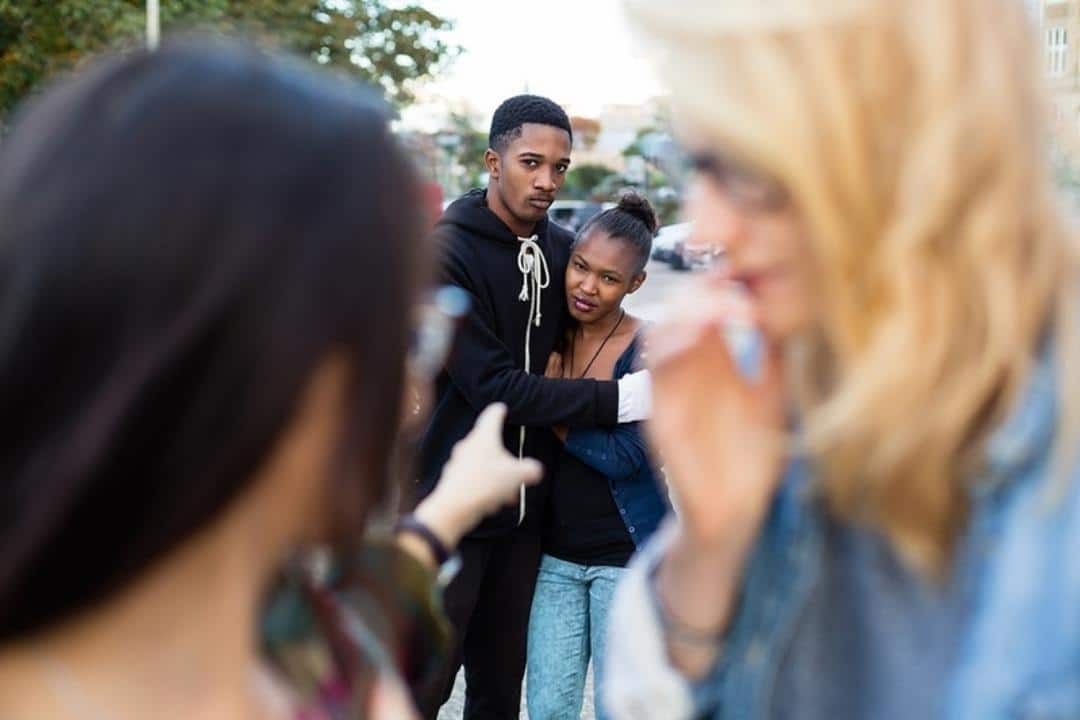We Need to Talk About Racial Trauma black teens hugging
