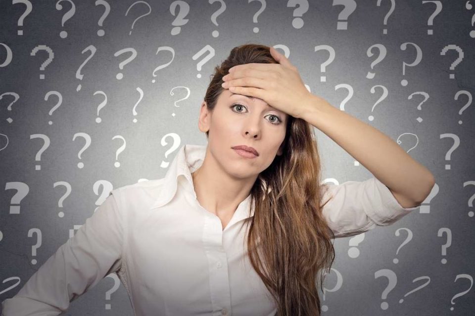 what causes stress stressed woman question marks