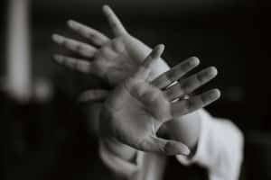 hands reaching out and responding to exposure therapy