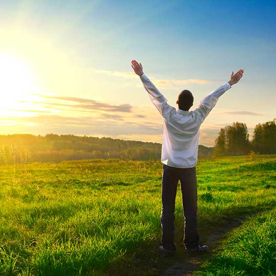 Image of a man outside with his hands raised. Heal trauma with online EMDR Therapy in Houston TX 77001. EMDR is a tool used in trauma therapy. Work with a EMDR therapist to start EMDR therapy in Houston, TX 77002. 77003 | 77004
