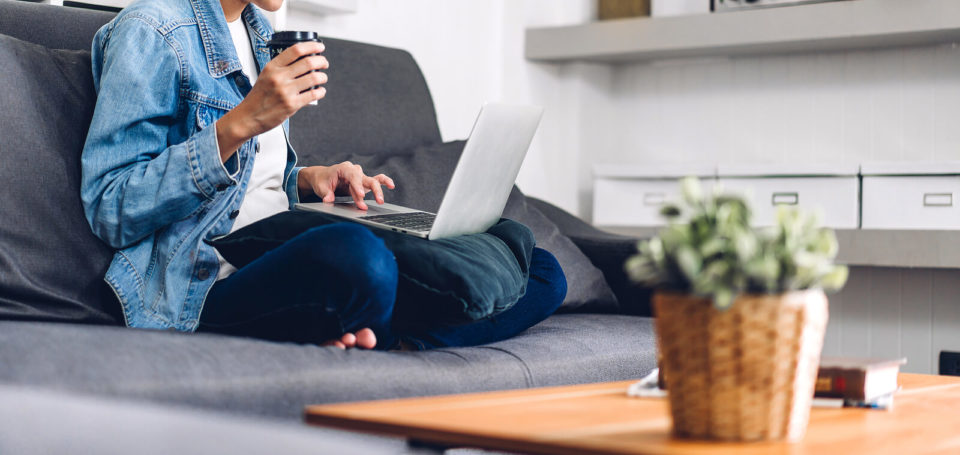 Image of a person sitting on a couch with a laptop. There are a lot of benefits to doing online therapy in Washington. Adam is a licensed online therapist in Washington who can help you. Whether you are in Seattle, Spokane, or Kennewick call today to start working on your mental health through online counseling.