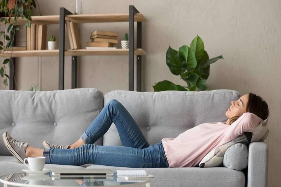 ways to relax anxiety woman on couch